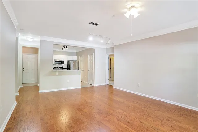 a view of kitchen with wooden floor