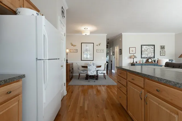 a bedroom with a bed and a chair