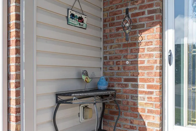 a view of a chairs and table on the deck