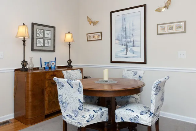 a view of a dining room with furniture
