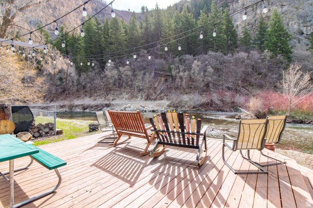 3711 North Canyon Road Provo, UT 84604 - Photo 42 of 42 Wooden terrace featuring a mountain view and a forest view