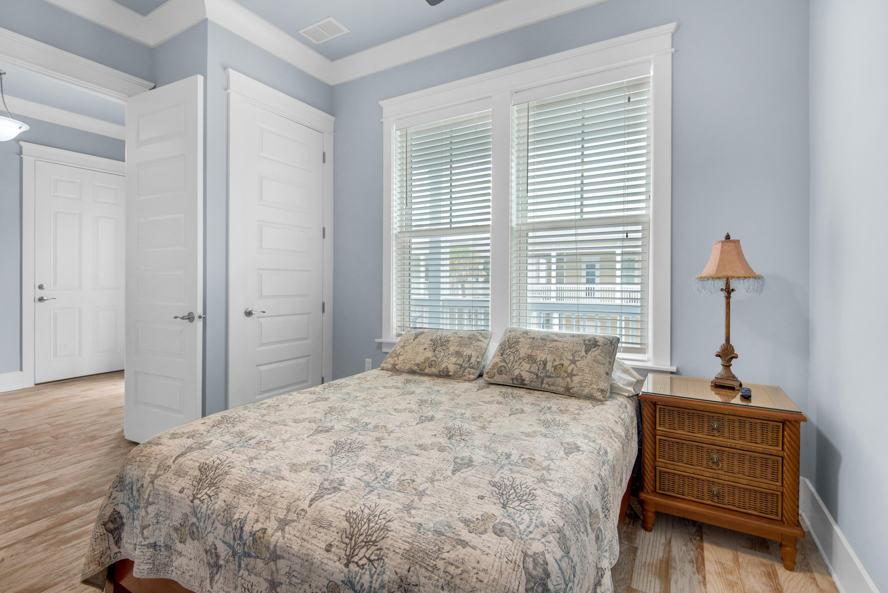 1494 Seaside Circle Navarre, FL 32566 - Photo 20 of 69 a bedroom with a bed and a window