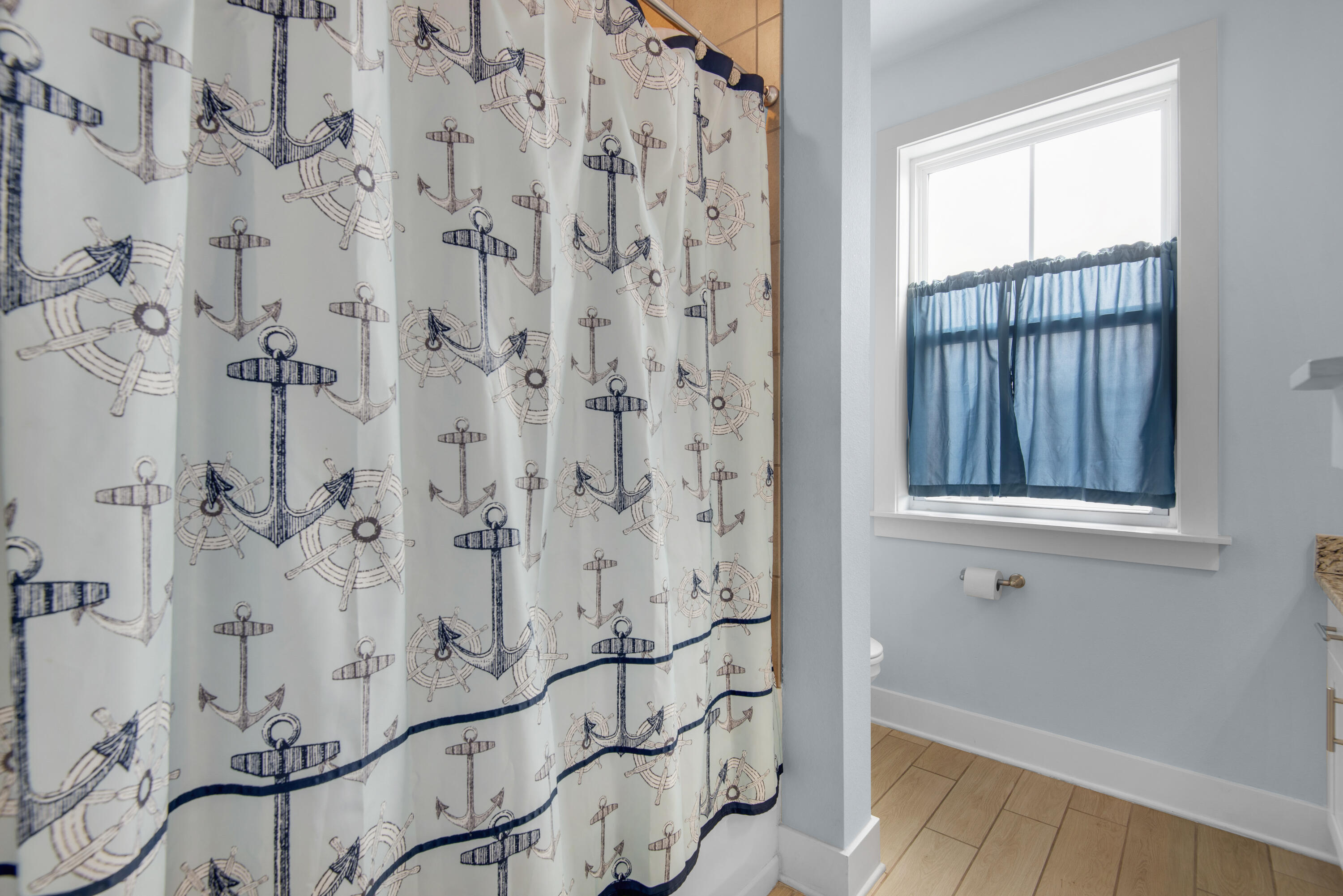 1494 Seaside Circle Navarre, FL 32566 - Photo 34 of 69 a bathroom with a bathtub and shower