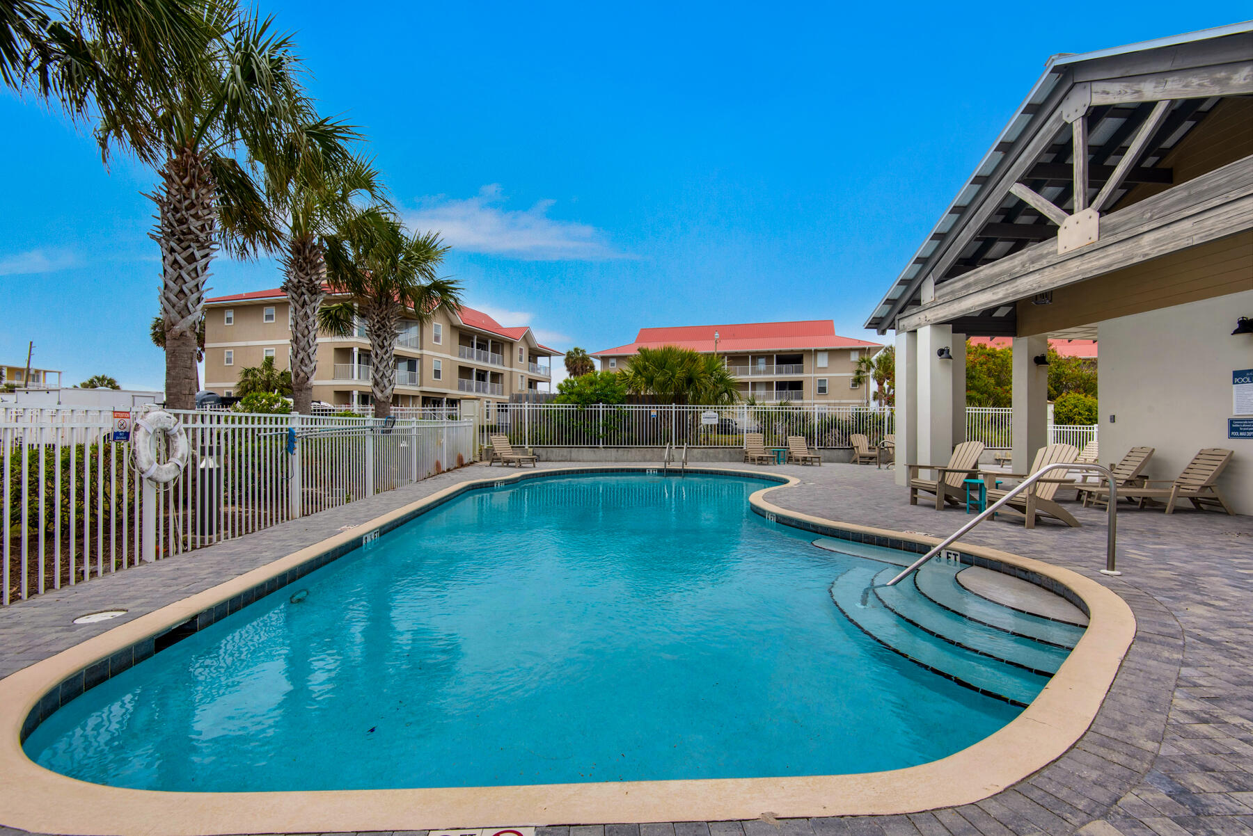 1494 Seaside Circle Navarre, FL 32566 - Photo 44 of 69 a view of a swimming pool with sitting area