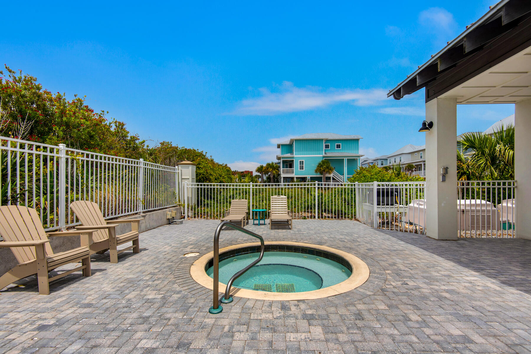 1494 Seaside Circle Navarre, FL 32566 - Photo 47 of 69 a view of a chairs and tables in the back yard