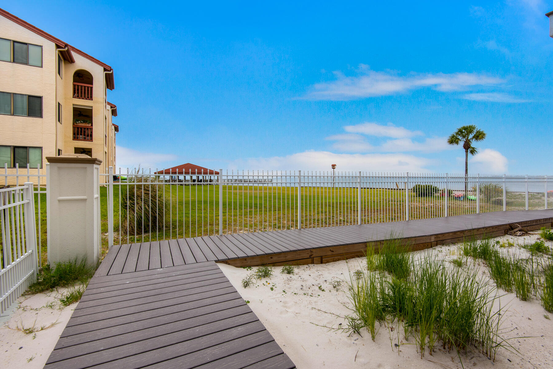 1494 Seaside Circle Navarre, FL 32566 - Photo 48 of 69 a view of a swimming pool with a patio