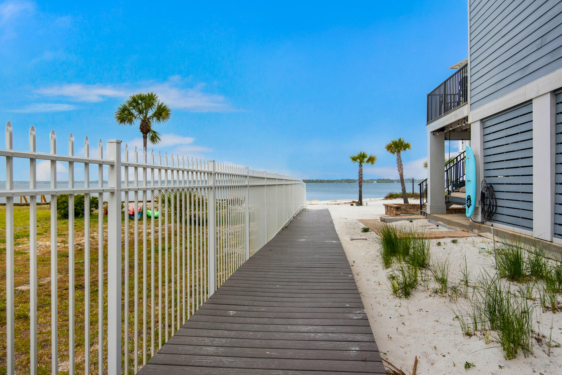 1494 Seaside Circle Navarre, FL 32566 - Photo 49 of 69 a view of a balcony with a potted plants