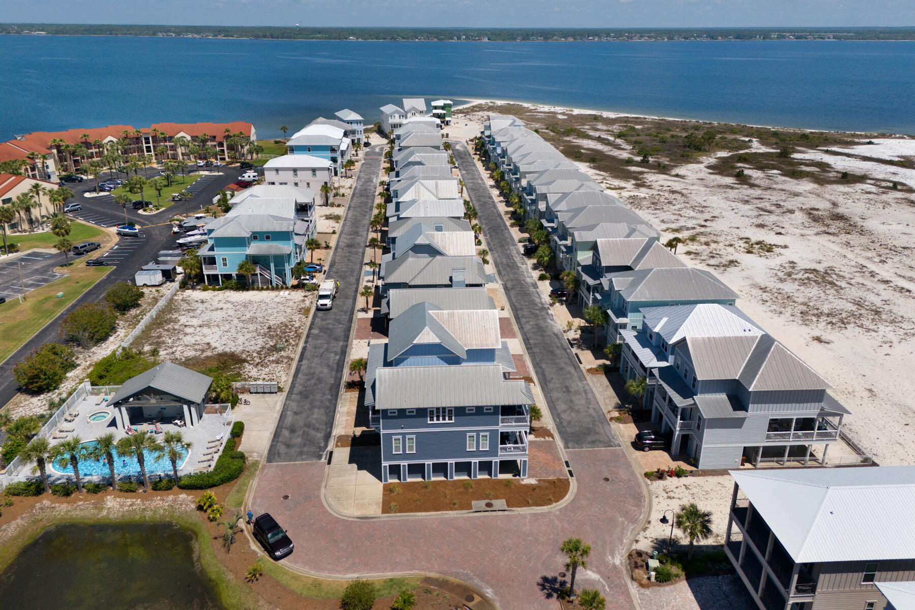 1494 Seaside Circle Navarre, FL 32566 - Photo 52 of 69 an aerial view of residential houses with outdoor space