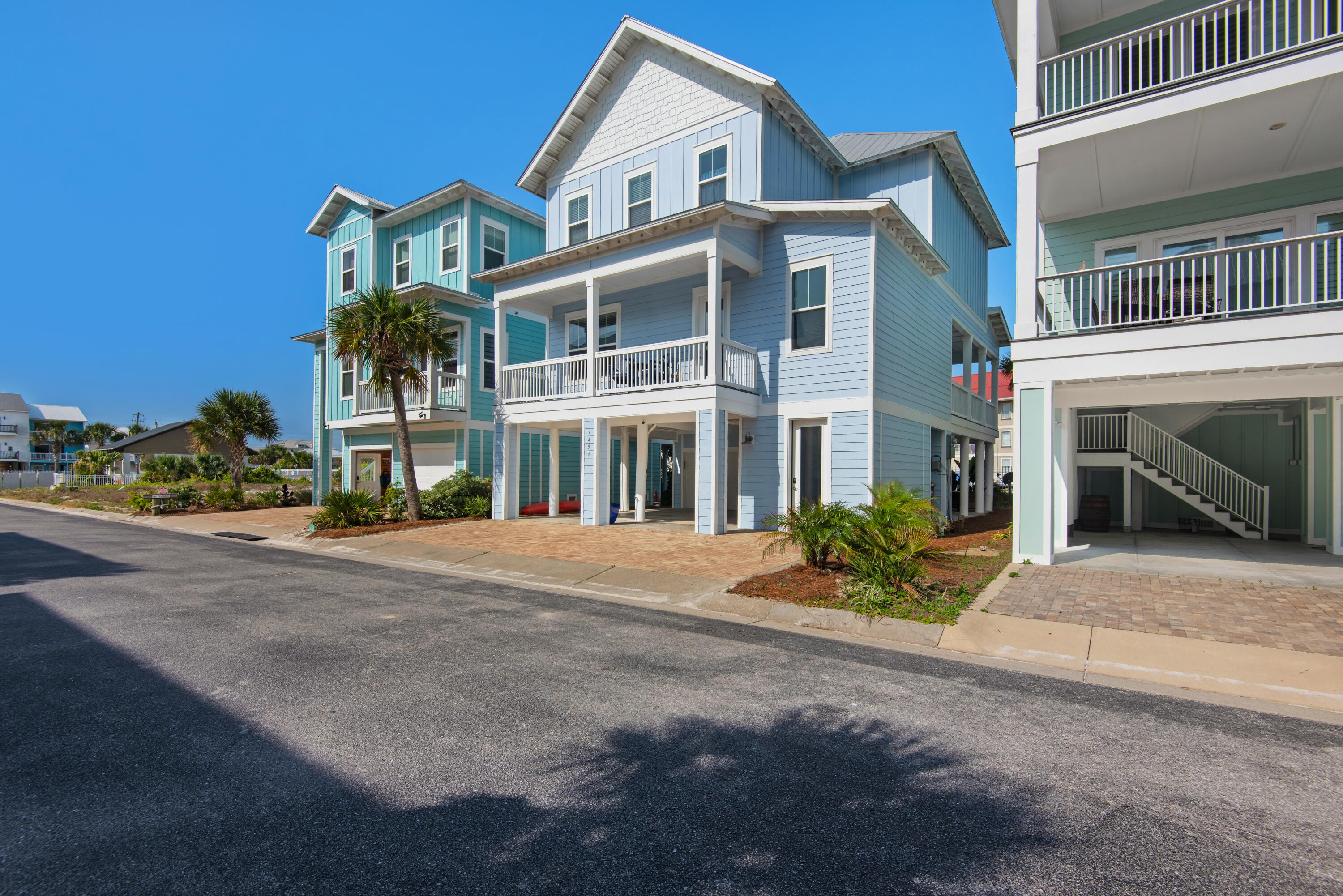 1494 Seaside Circle Navarre, FL 32566 - Photo 57 of 69 a front view of a house with a yard
