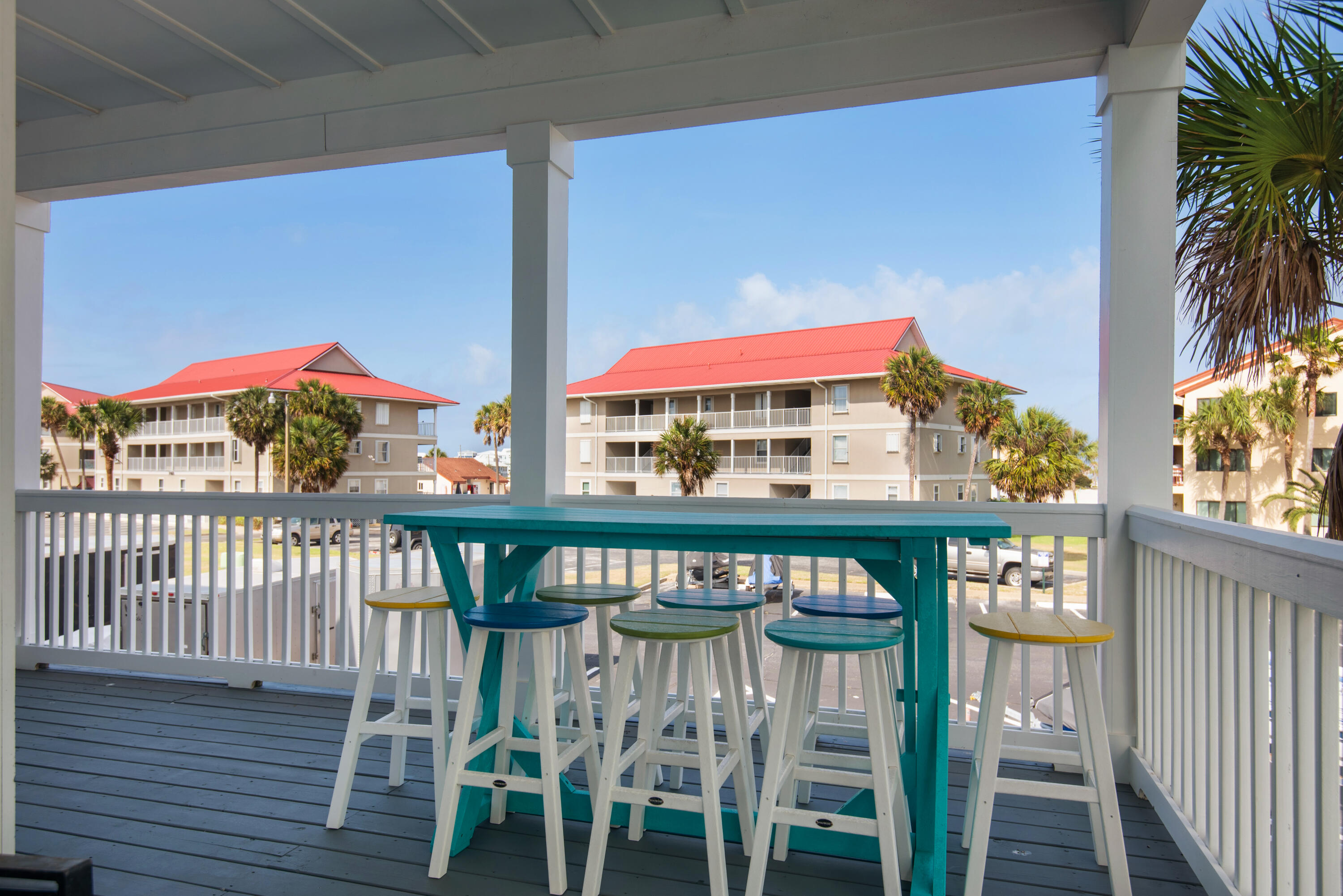 1494 Seaside Circle Navarre, FL 32566 - Photo 65 of 69 a view of a chairs and table in patio
