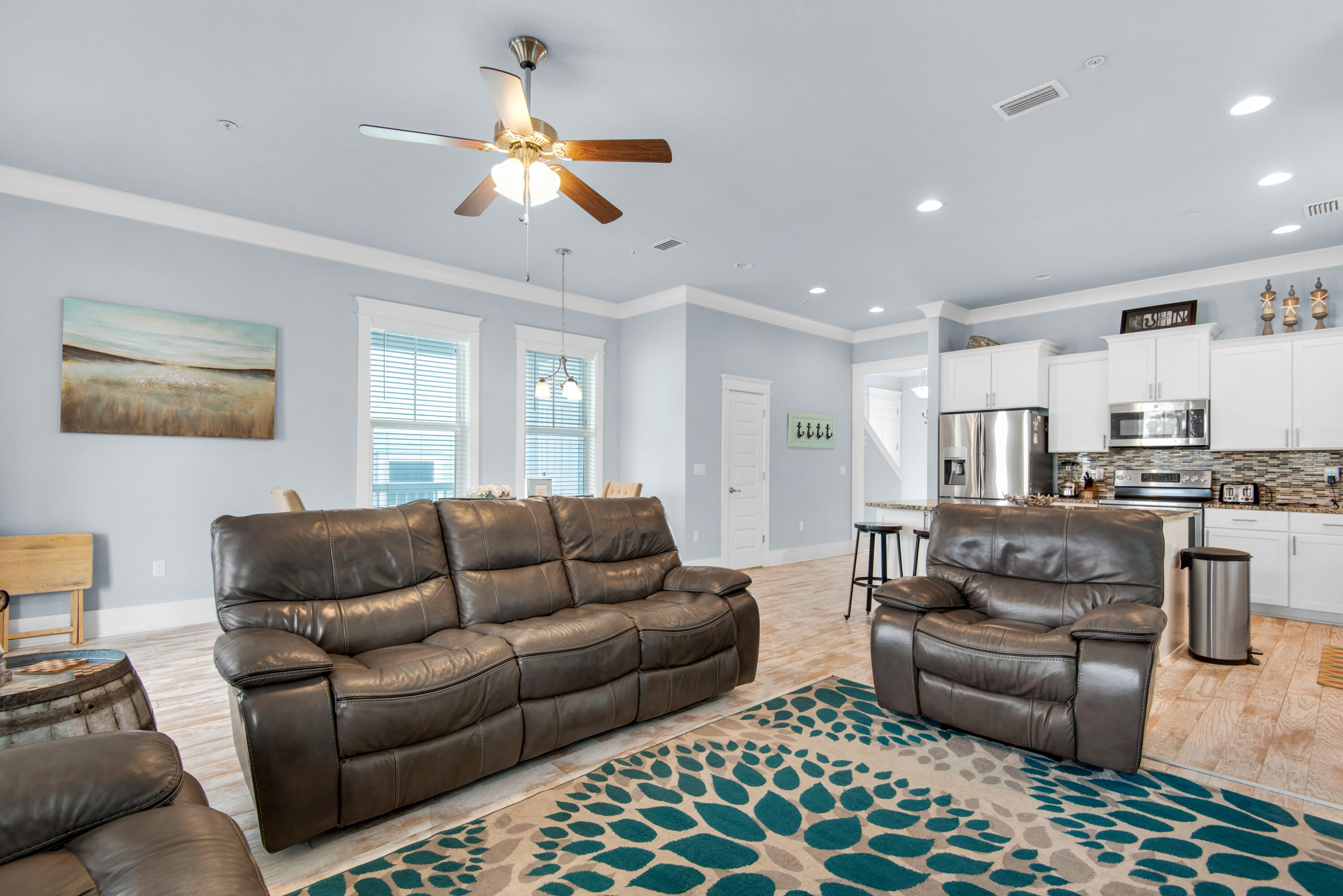 1494 Seaside Circle Navarre, FL 32566 - Photo 9 of 69 a living room with furniture and a rug