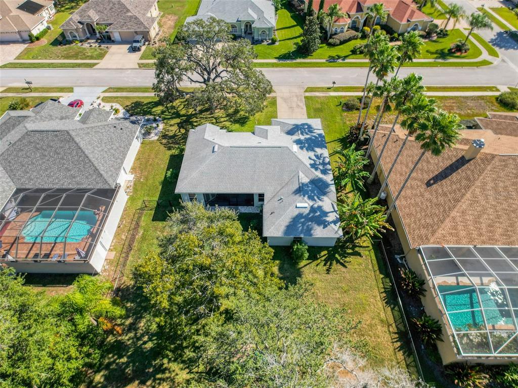 3365 Indian River Street Spring Hill, FL 34609 - Photo 34 of 38 an aerial view of a house with swimming pool garden and mountain view in back