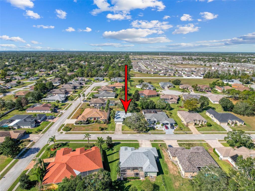 3365 Indian River Street Spring Hill, FL 34609 - Photo 37 of 38 an aerial view of residential houses with outdoor space and ocean view