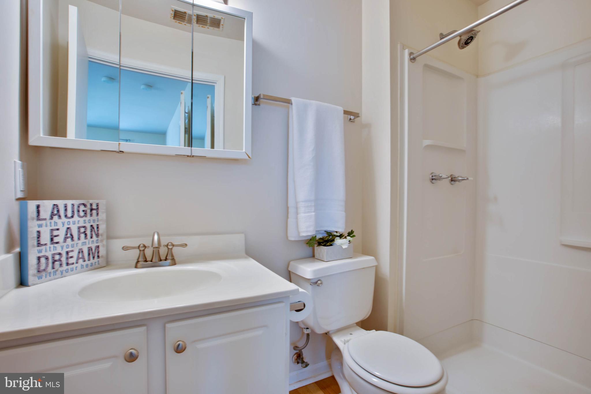 18318 Streamside Drive, Unit 203 Gaithersburg, MD 20879 - Photo 23 of 25 Owners Suite full bath