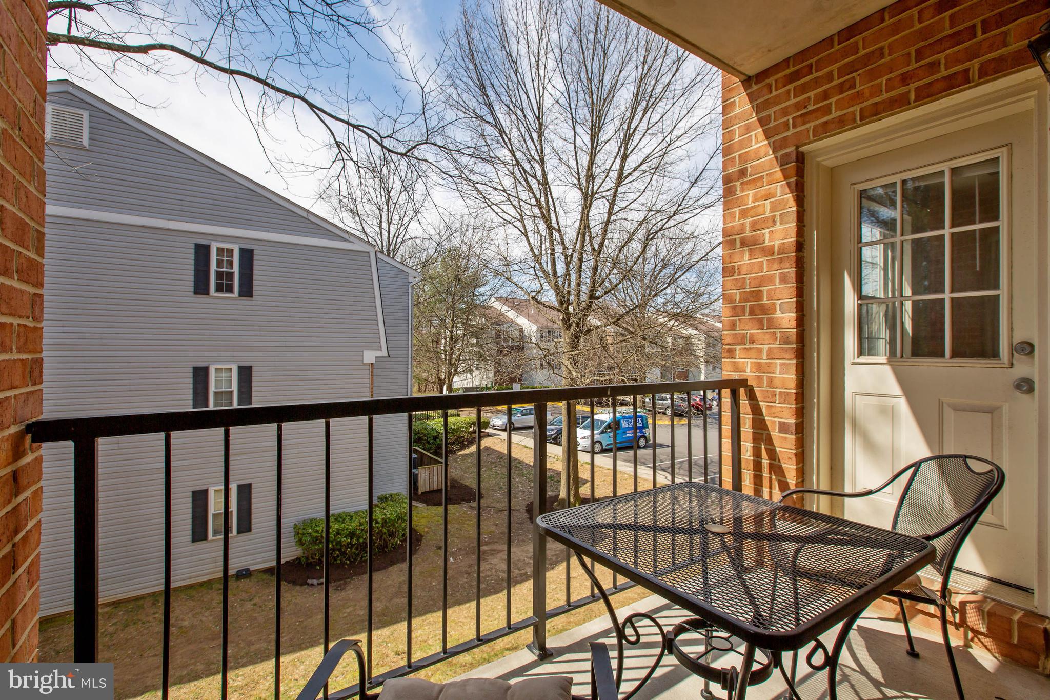 18318 Streamside Drive, Unit 203 Gaithersburg, MD 20879 - Photo 10 of 25 Relax on the balcony