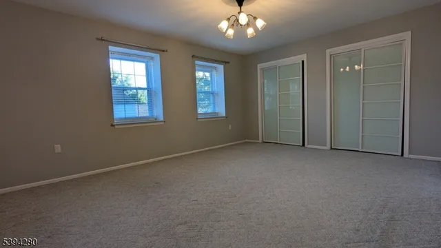 wooden floor and windows in an empty room