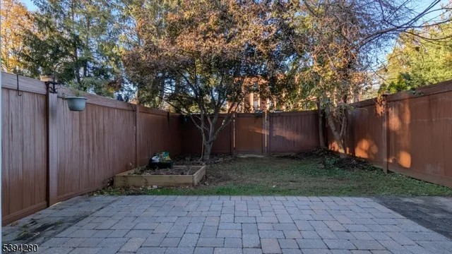 a view of a back yard with green space