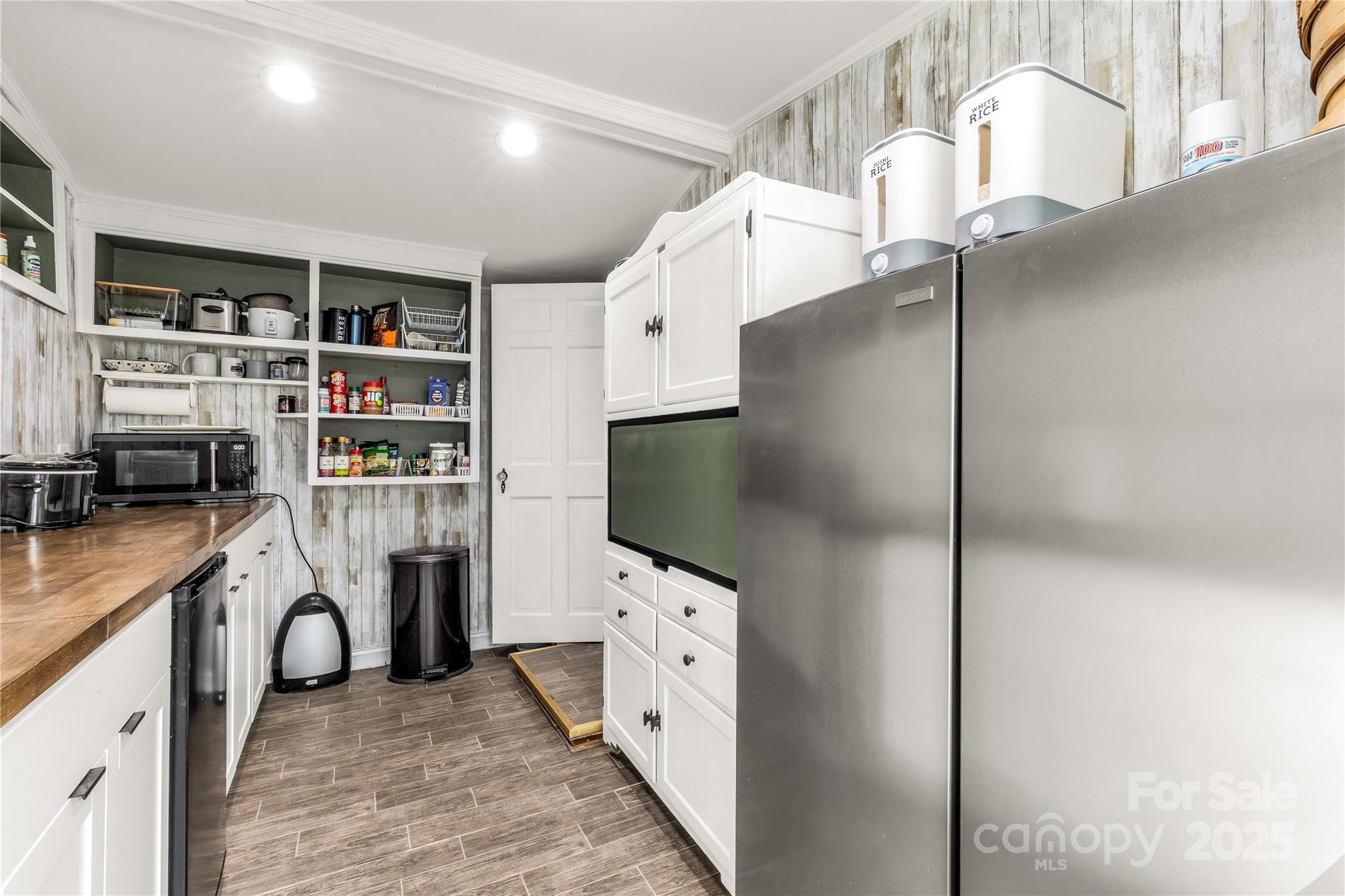 226 Liberty Street East York, SC 29745 - Photo 11 of 48 a kitchen with refrigerator and cabinets
