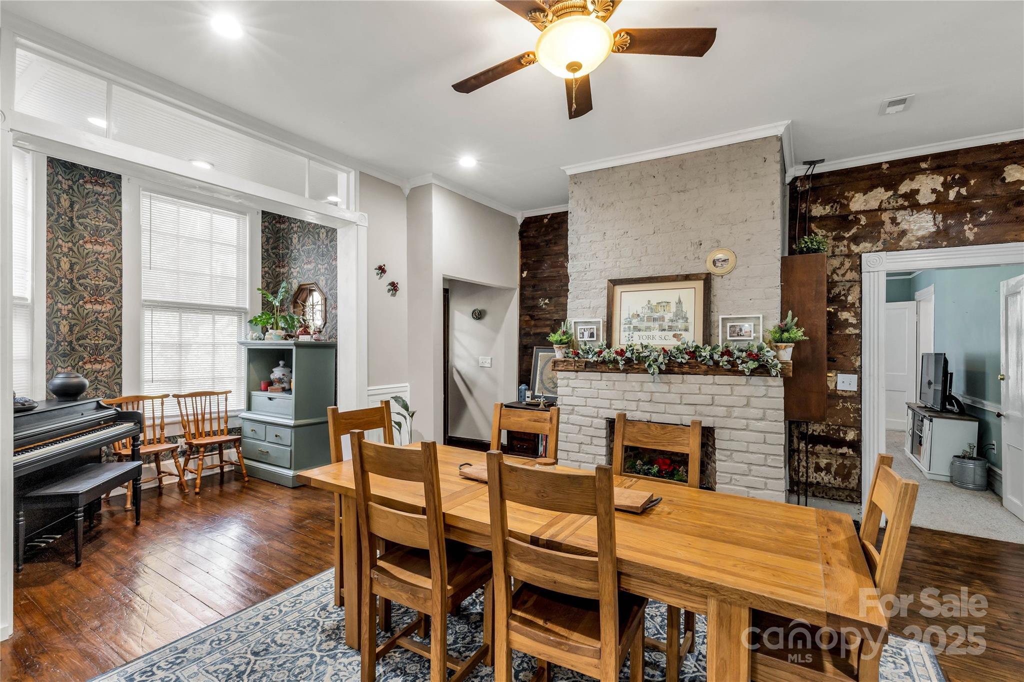 226 Liberty Street East York, SC 29745 - Photo 13 of 48 a dining room with furniture a rug and wooden floor