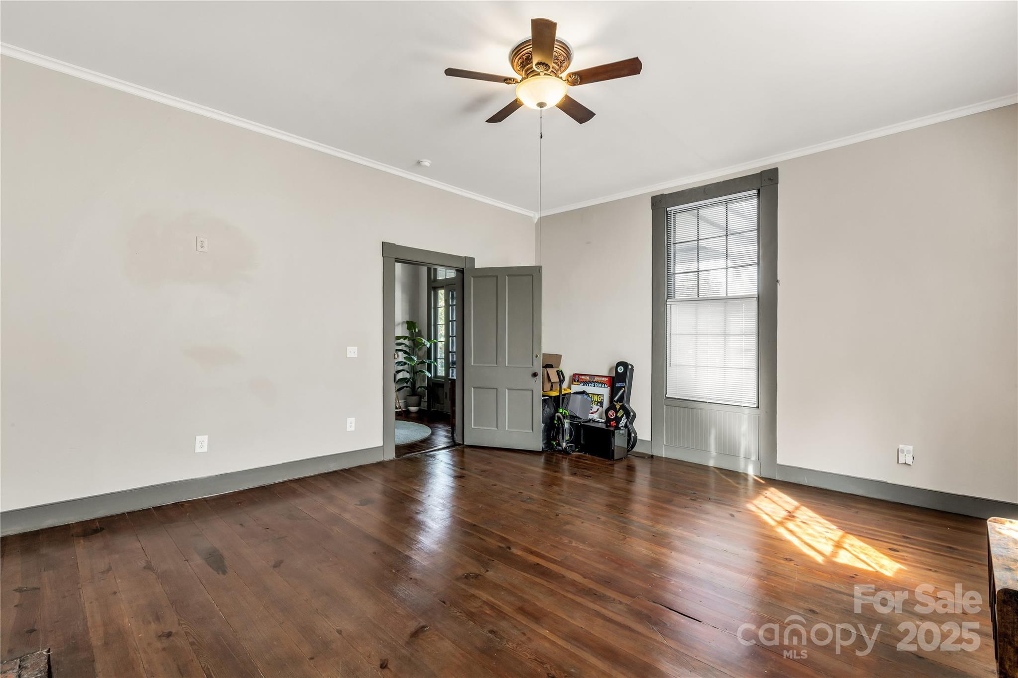 226 Liberty Street East York, SC 29745 - Photo 35 of 48 wooden floor in an empty room with a window