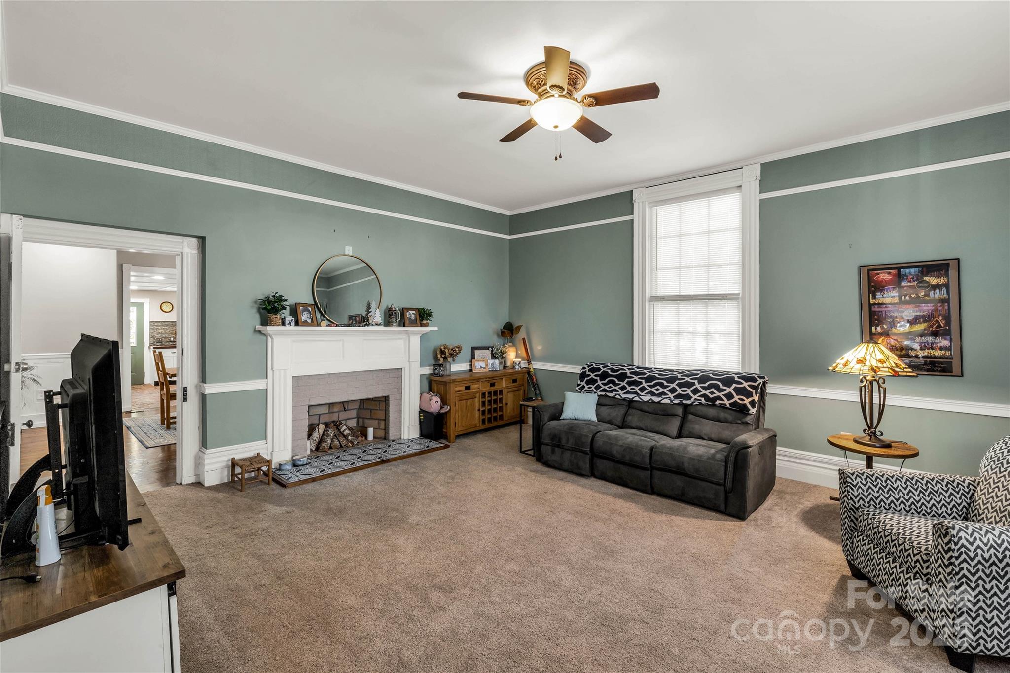 226 Liberty Street East York, SC 29745 - Photo 4 of 48 a living room with furniture and a fireplace