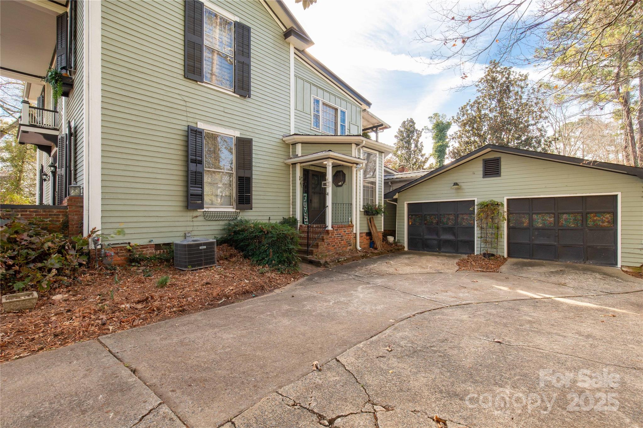 226 Liberty Street East York, SC 29745 - Photo 41 of 48 a front view of a house with garden