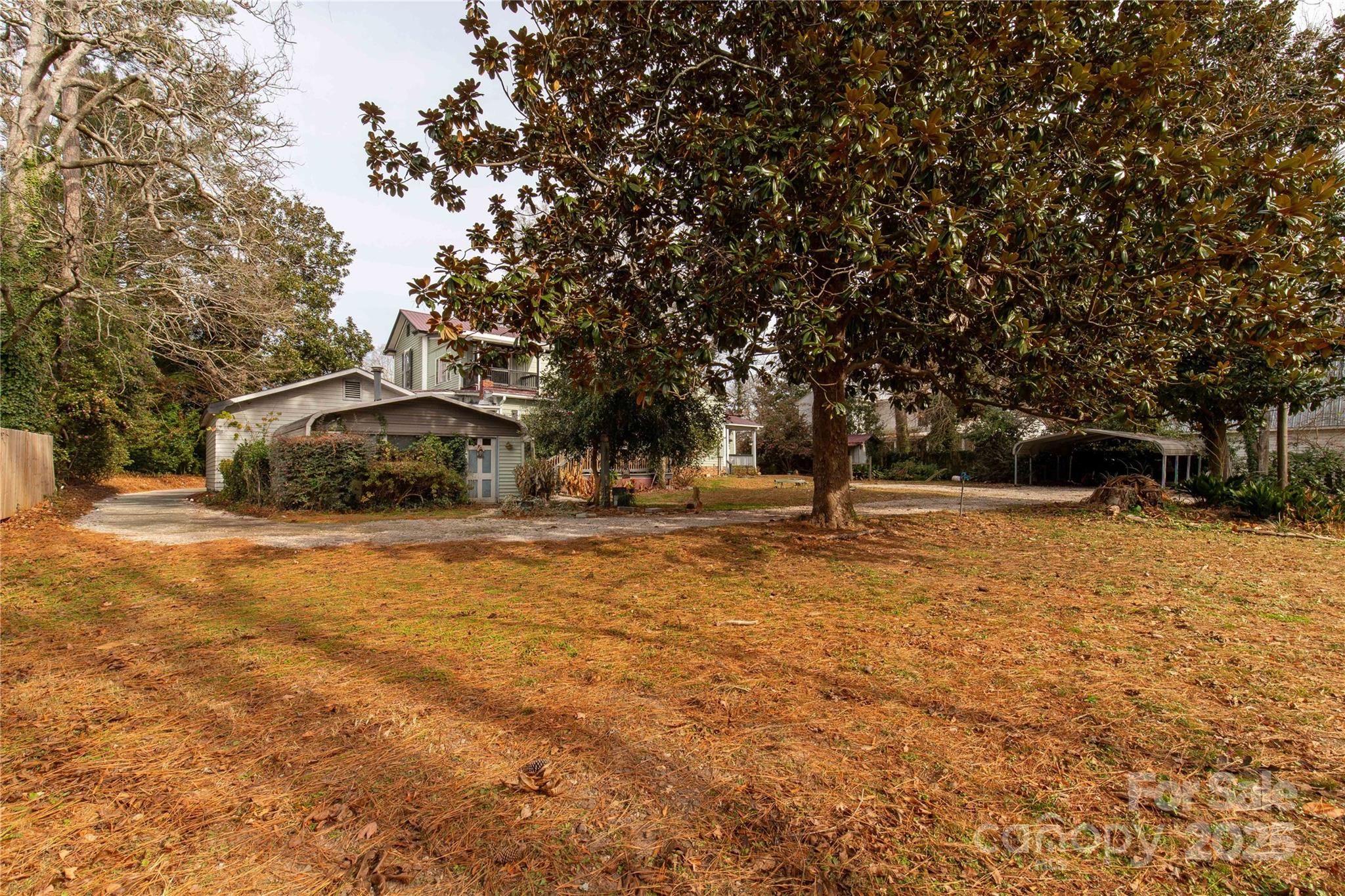 226 Liberty Street East York, SC 29745 - Photo 46 of 48 a house with trees in the background