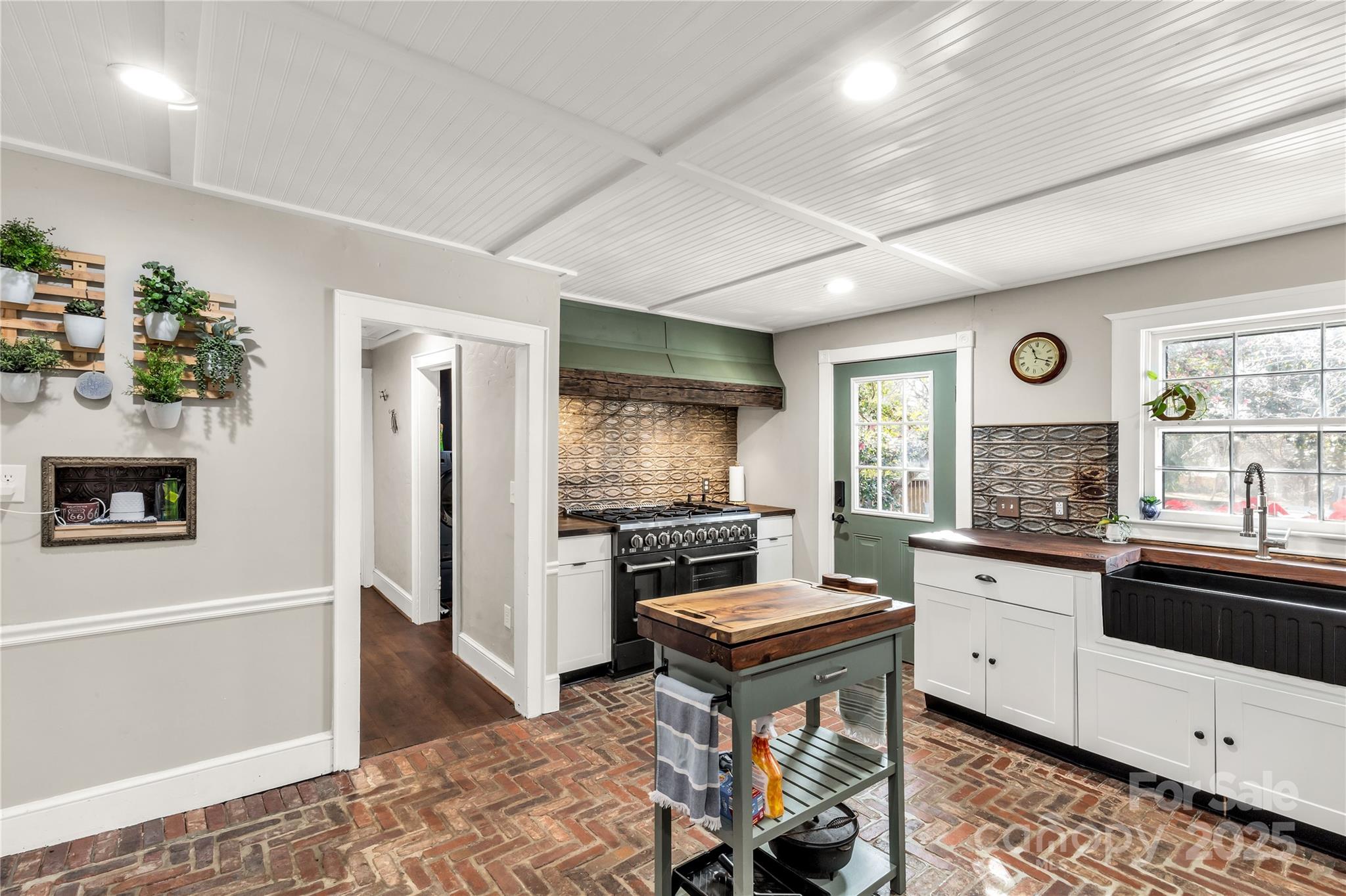 226 Liberty Street East York, SC 29745 - Photo 9 of 48 a kitchen with granite countertop a stove a sink and a refrigerator