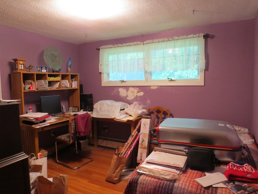 29 Birchwood Road Rutland, MA 01543 - Photo 12 of 17 a bedroom with a bed and a window