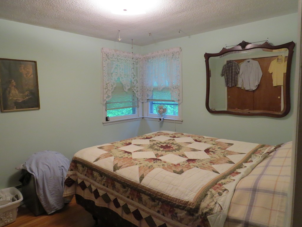 29 Birchwood Road Rutland, MA 01543 - Photo 14 of 17 a bedroom with a bed and a dresser