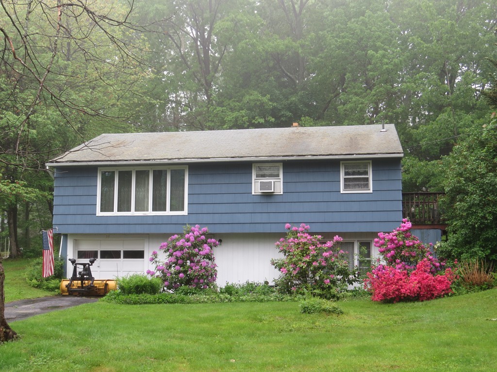 29 Birchwood Road Rutland, MA 01543 - Photo 17 of 17 a front view of house with yard and green space
