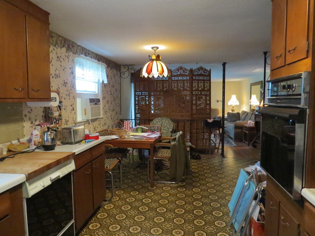 29 Birchwood Road Rutland, MA 01543 - Photo 9 of 17 a kitchen with stainless steel appliances a sink stove and cabinets