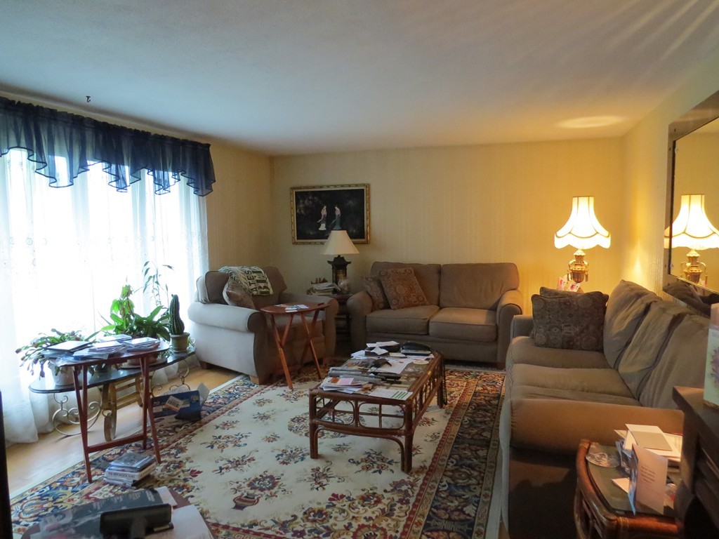 29 Birchwood Road Rutland, MA 01543 - Photo 10 of 17 a living room with furniture and a large window