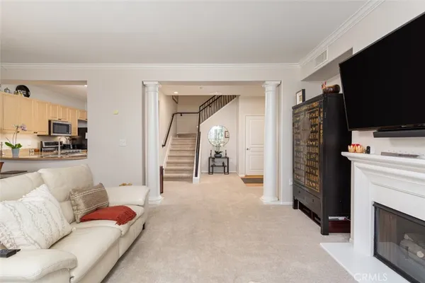 a view of livingroom with furniture and flat screen tv