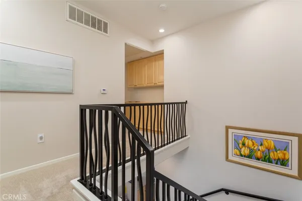 a view of a hallway with workspace