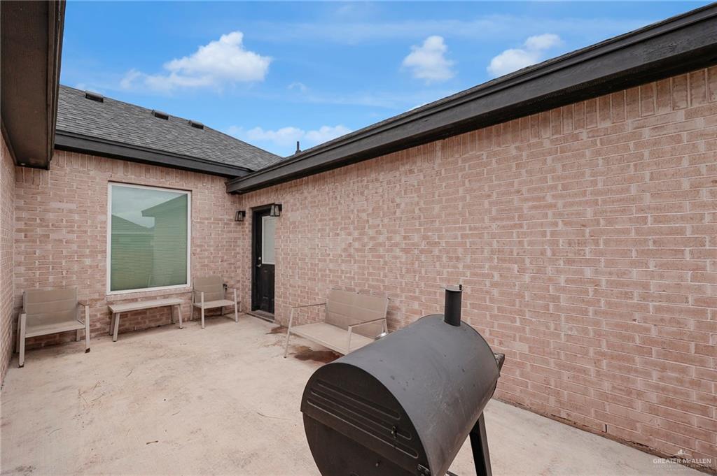 502 Oak Ridge Street Donna, TX 78537 - Photo 19 of 28 a view of balcony with chairs