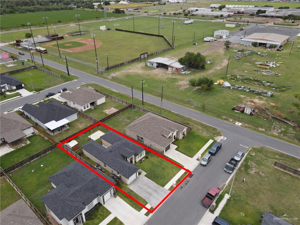 502 Oak Ridge Street Donna, TX 78537 - Photo 23 of 28 an aerial view of a pool yard patio and outdoor seating