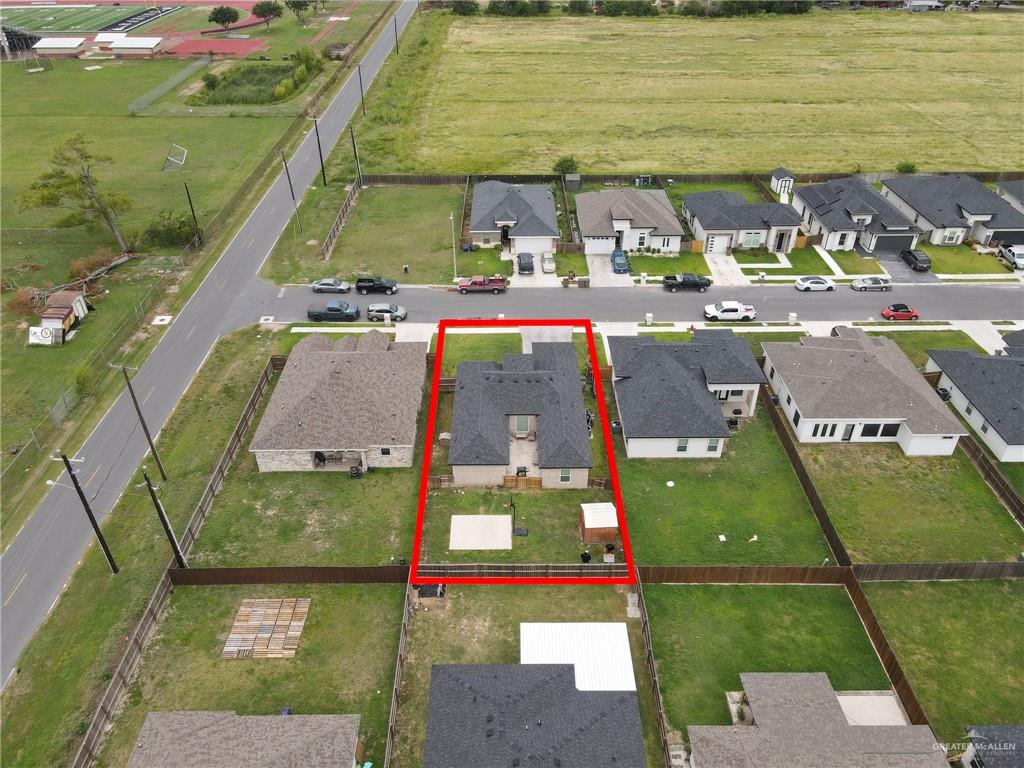 502 Oak Ridge Street Donna, TX 78537 - Photo 26 of 28 a view of swimming pool with a yard