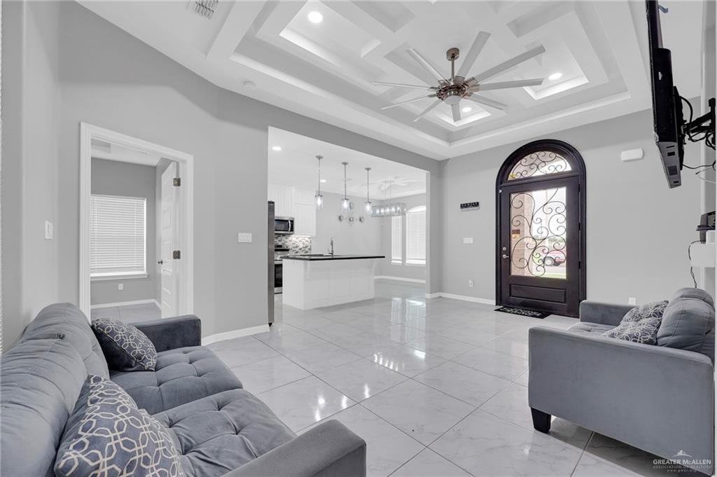 502 Oak Ridge Street Donna, TX 78537 - Photo 5 of 28 a living room with furniture and a window