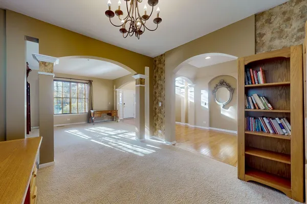 a bed room with furniture and wooden floor