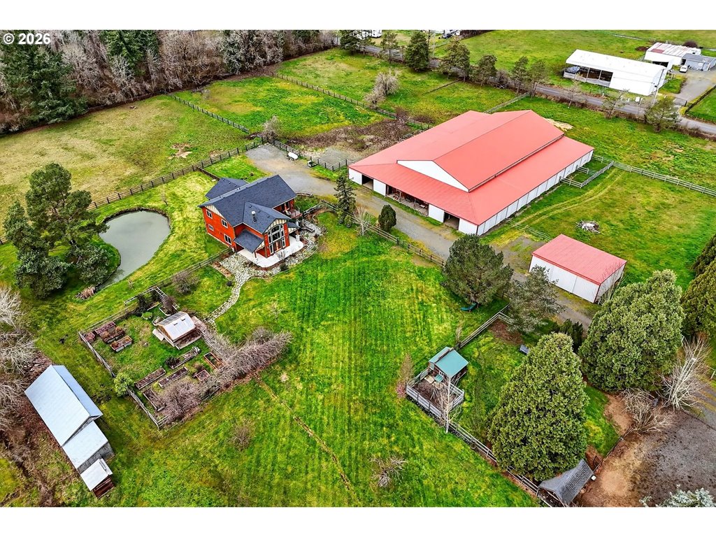 an aerial view of a house with a garden