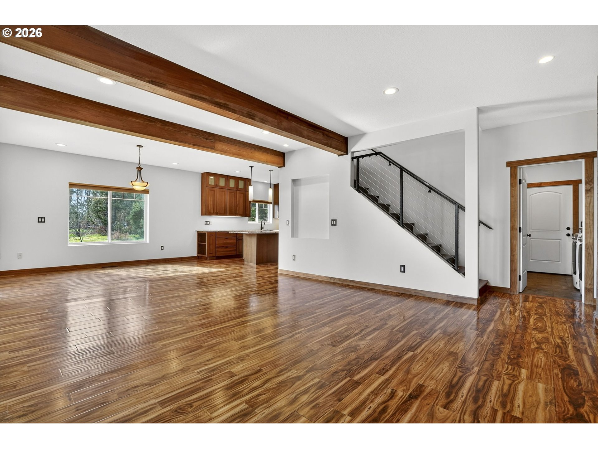24677 Southeast Van Curen Road Eagle Creek, OR 97022 - Photo 11 of 48 a view of empty room with wooden floor and windows