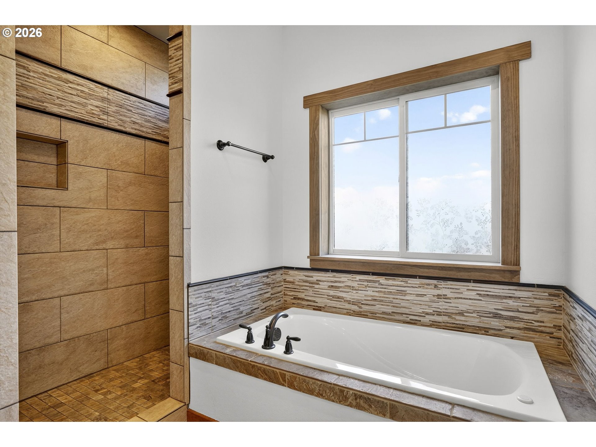 24677 Southeast Van Curen Road Eagle Creek, OR 97022 - Photo 14 of 48 a bathroom with a bathtub and a window