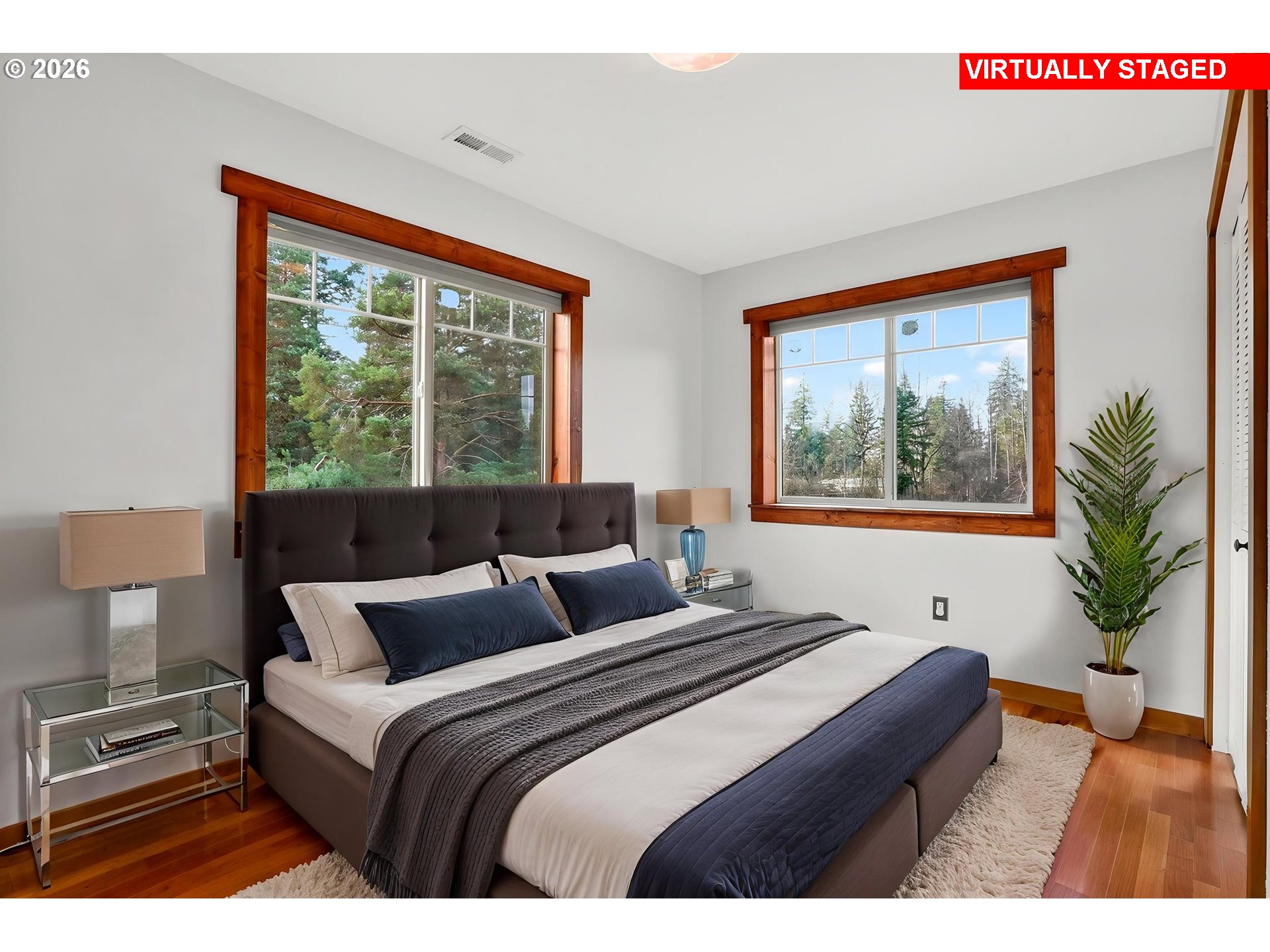 24677 Southeast Van Curen Road Eagle Creek, OR 97022 - Photo 21 of 48 a bedroom with a large bed and a window