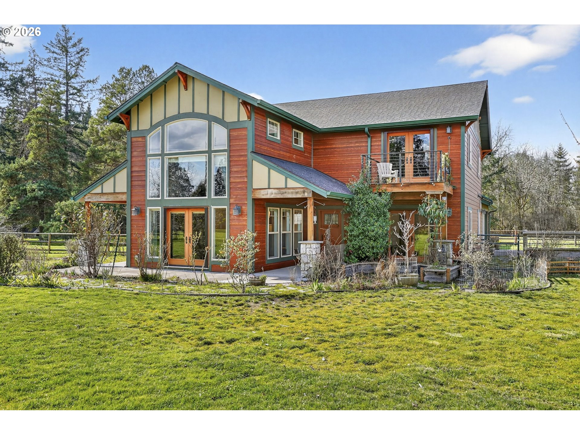 24677 Southeast Van Curen Road Eagle Creek, OR 97022 - Photo 3 of 48 a front view of a house with a yard