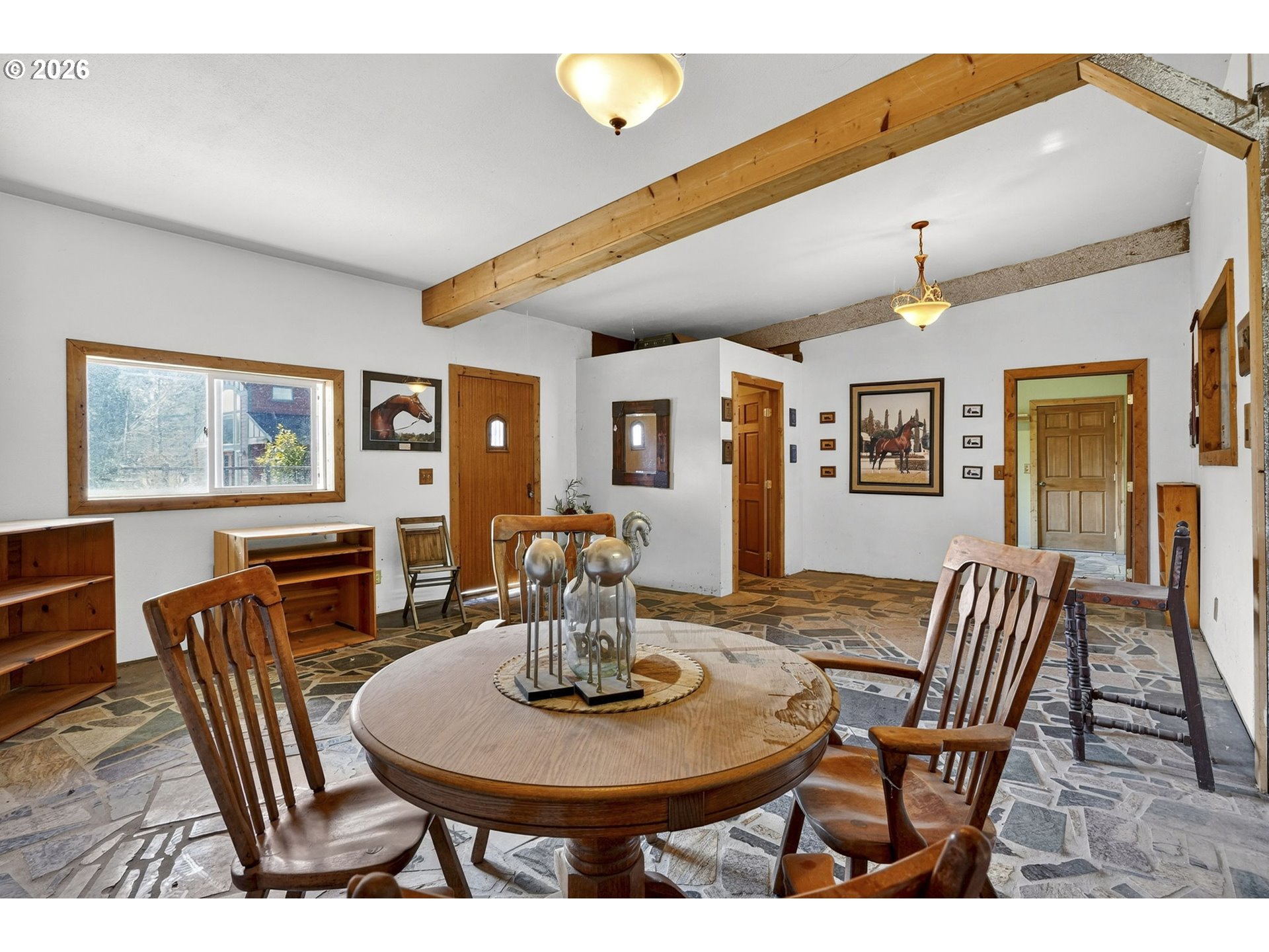 24677 Southeast Van Curen Road Eagle Creek, OR 97022 - Photo 36 of 48 a dining room with furniture a rug and wooden floor