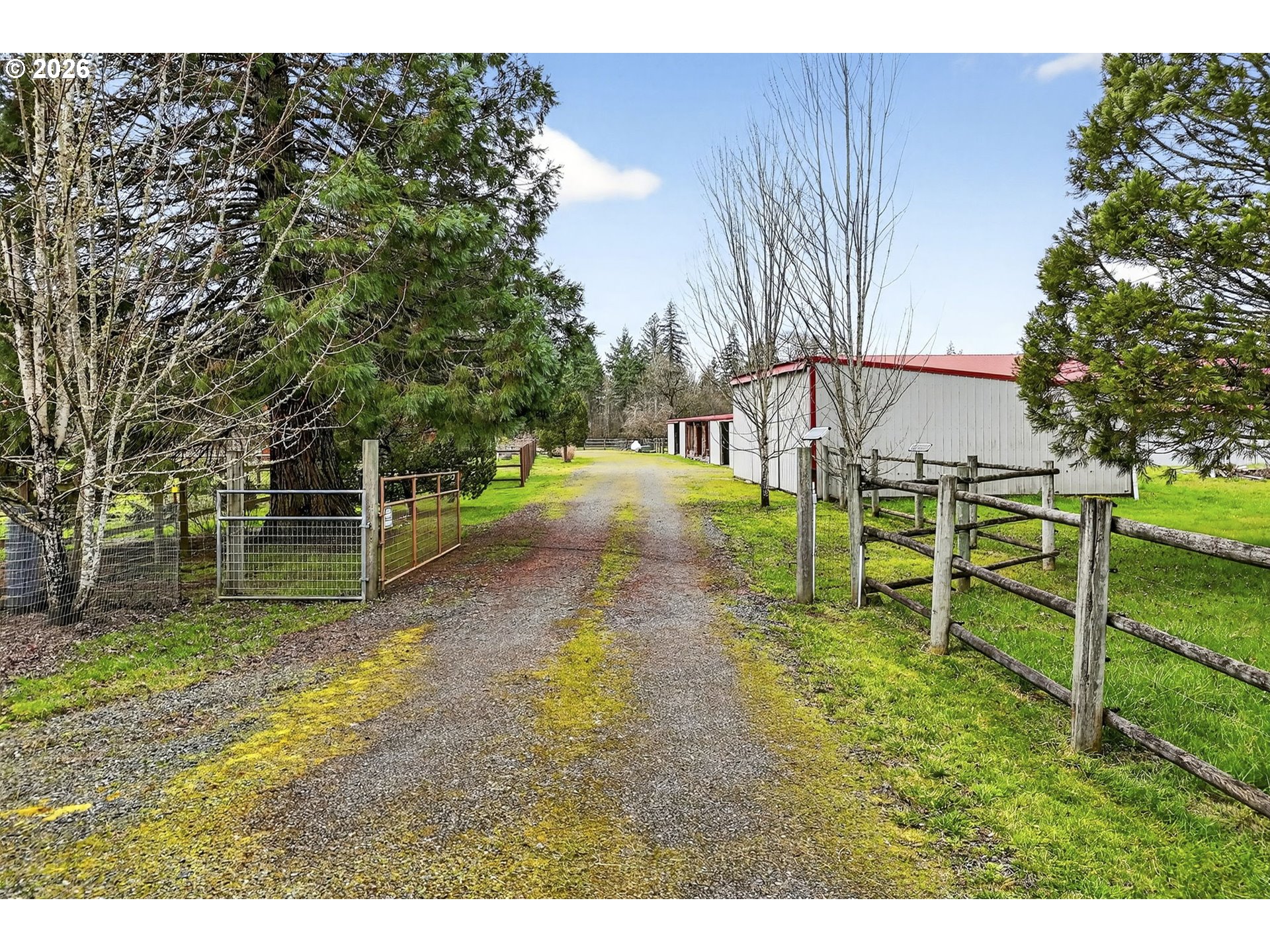 24677 Southeast Van Curen Road Eagle Creek, OR 97022 - Photo 44 of 48 a backyard of a house with table and chairs