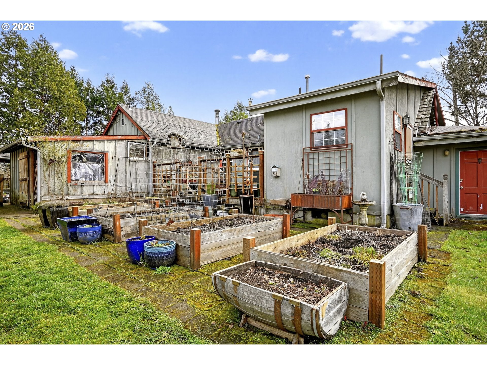 24677 Southeast Van Curen Road Eagle Creek, OR 97022 - Photo 47 of 48 a view of a house with backyard tub and fire pit