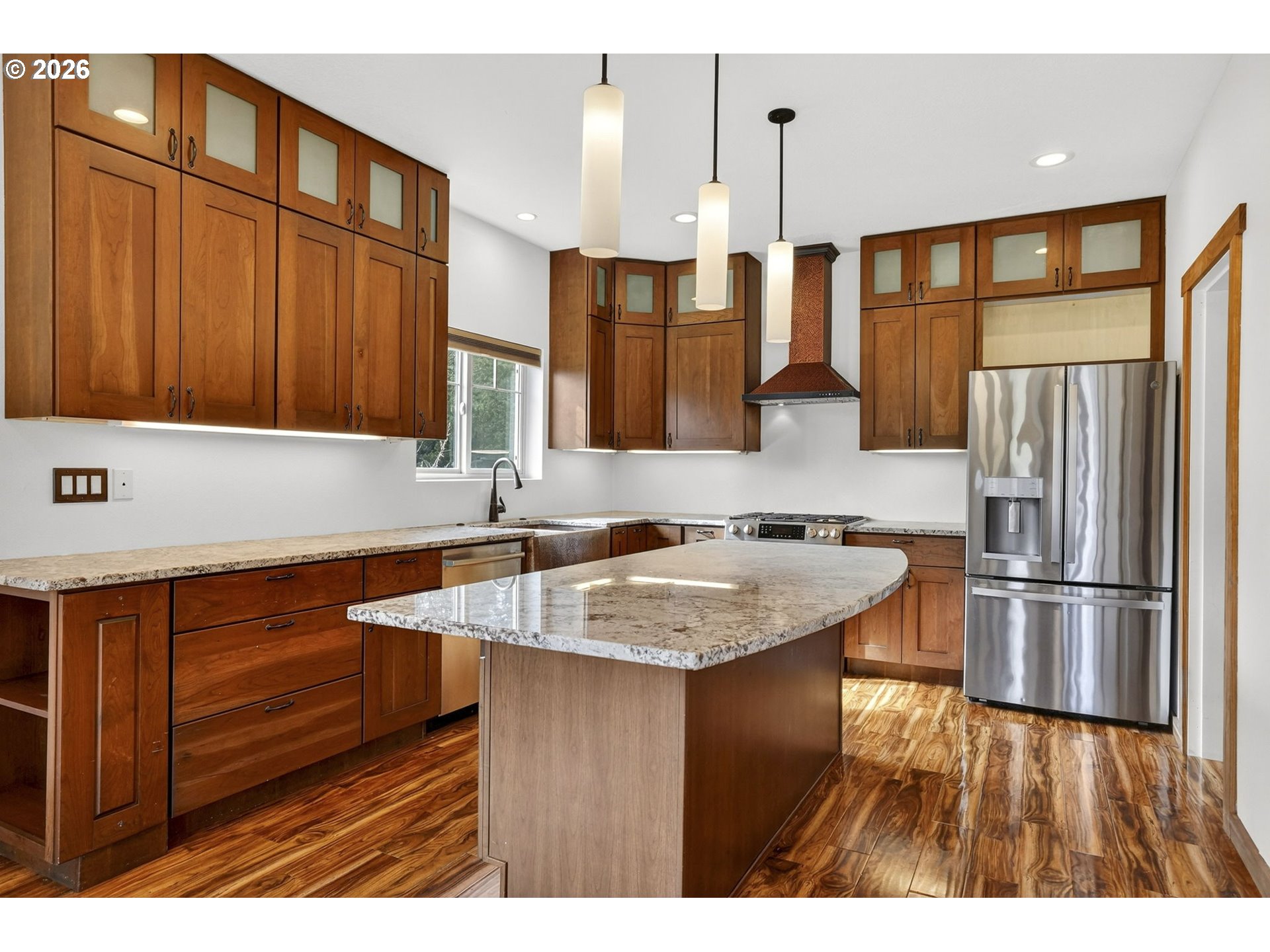 24677 Southeast Van Curen Road Eagle Creek, OR 97022 - Photo 6 of 48 a kitchen with stainless steel appliances granite countertop a sink stove and refrigerator