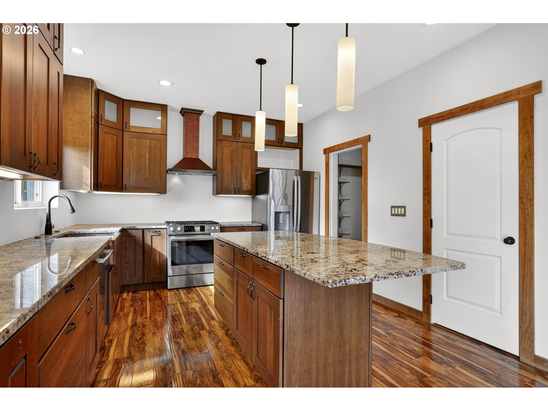 24677 Southeast Van Curen Road Eagle Creek, OR 97022 - Photo 8 of 48 a kitchen with stainless steel appliances granite countertop a sink refrigerator and cabinets